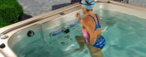 How can you get the benefits of a treadmill at low impact in your swim spa?